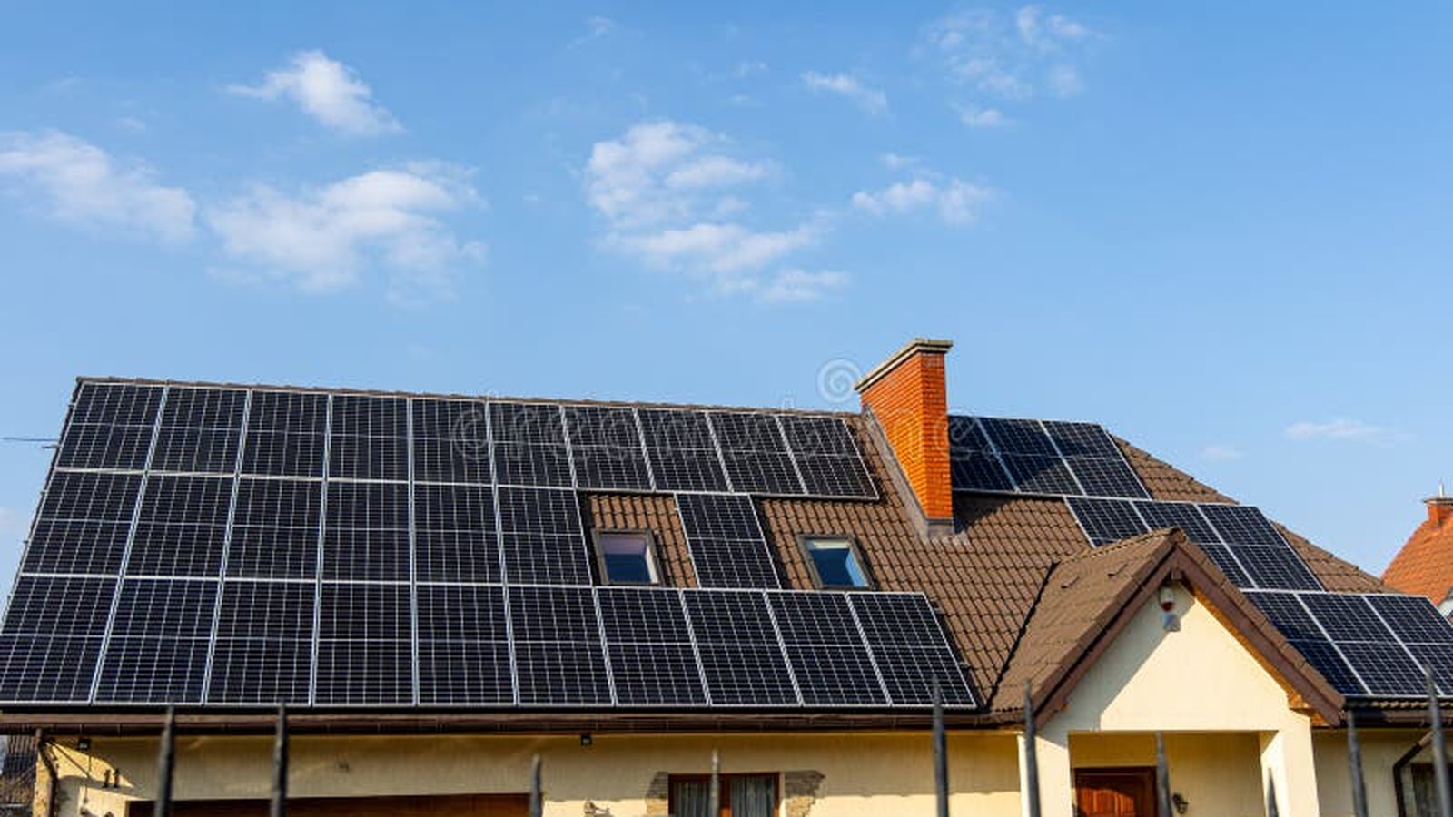 Modern home with residential solar panels and energy storage system